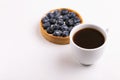 Tasty blueberry tart with vanilla cream and cup of coffee Royalty Free Stock Photo