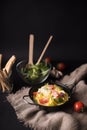 tasty boiled spaghetti pasta with basil leaves tomato sack with bread sticks veg salad. High quality photo Royalty Free Stock Photo