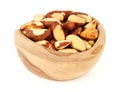 Tasty Brazil nuts in bowl isolated on white Royalty Free Stock Photo
