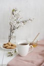 A tasty break: a cup of tea, a bowl of honey and a plate of cookies Royalty Free Stock Photo
