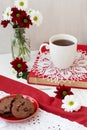 A tasty break: a cup of tea and a plate of cookies Royalty Free Stock Photo