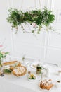 Tasty breakfast with croissants, pie, tea on table