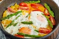 Tasty breakfast. Fried eggs in a pan with coffee Royalty Free Stock Photo