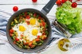 Tasty breakfast. Fried eggs with vegetables. Shakshuka. Royalty Free Stock Photo