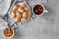 Tasty breakfast. Homemade sweet cinnamon cookies, cup of tea and apple confiture. Flatlay Royalty Free Stock Photo