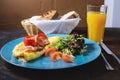 Tasty breakfast. omelet, bread and juice Royalty Free Stock Photo