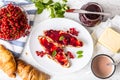 Tasty breakfast with red currants marmalade croissants butter an Royalty Free Stock Photo