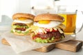 Tasty burgers with fried egg Royalty Free Stock Photo