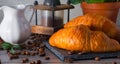 Tasty buttery croissants on wooden table close up. Royalty Free Stock Photo