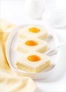 Tasty cake with cream and apricot. `Fried eggs` apricot cake. Royalty Free Stock Photo