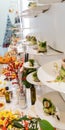 Tasty canapes plates in line hanging with caviar