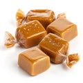 Tasty Caramel Toffees on white background Royalty Free Stock Photo