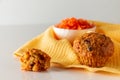 Carrot muffins on a white background. Homemade cakes on a yellow napkin