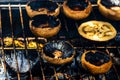 Tasty champignon  mushrooms and veggies being cooked on charcoal grill Royalty Free Stock Photo