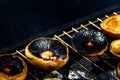 Tasty champignon  mushrooms and veggies being cooked on charcoal grill Royalty Free Stock Photo