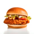 Tasty chicken burger with lettuce, sauce, cucumber and tomato on a white background