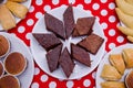 Tasty chocolate cake . top view plate stack of brownies with glass of milk in bright setting .Super Moist Chocolate Cake Recip . Royalty Free Stock Photo