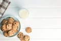 Tasty chocolate chip cookies and glass of milk on wooden table Royalty Free Stock Photo