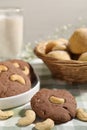 Tasty chocolate cookies with cashew on table, closeup Royalty Free Stock Photo