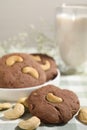 Tasty chocolate cookies with cashew on table, closeup Royalty Free Stock Photo
