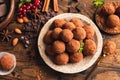 Tasty chocolate truffles on plate Royalty Free Stock Photo