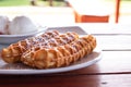 Tasty churros with sugar powder with ice cream Royalty Free Stock Photo