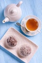 Tasty cocoa and chocolate cakes and cup of tea. Royalty Free Stock Photo