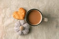 Tasty cocoa, cookies and knitted handcrafted pumpkin on the table, Thanksgiving autumn fall seasonal concept, moody season