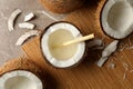 Tasty coconut with straw on bamboo background