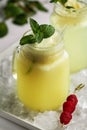 Tasty cold fresh drink lemonade with lemon, ice cream, mint, ice Royalty Free Stock Photo