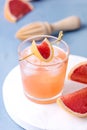 Tasty Cold Wet Drinking Glass With Fresh Grapefruit Summer Alcohol Cocktail Grapefruit Juice Ice Blue Background Vertical Above