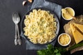 Tasty cooked italian farfalle pasta bow-tie or butterfly with cheese sauce. Royalty Free Stock Photo