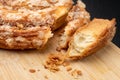 Tasty cookie broken in half. Fresh bread on a kitchen board Royalty Free Stock Photo