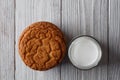 Tasty cookies and a glass of milk in a transparent glass on a white background Royalty Free Stock Photo