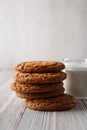 Tasty cookies and a glass of milk in a transparent glass on a white background Royalty Free Stock Photo