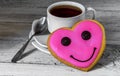 Tasty cookies in the shape of a heart with Cup tea Royalty Free Stock Photo