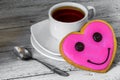 Tasty cookies in the shape of a heart with Cup tea Royalty Free Stock Photo