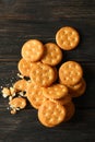 Tasty cracker biscuits on wooden background, top view