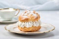 Tasty cream puff pastry on plate