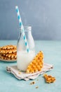 Tasty crispy waffles with milk