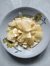The tasty and crunchy of the breadfruit chips on the white marble Royalty Free Stock Photo