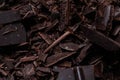 Tasty crushed dark chocolate as background Royalty Free Stock Photo