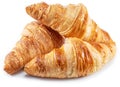 Tasty crusty croissants close-up on a white background