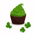 Tasty cupcake and clover, on white. Saint Patrics Day design elements