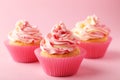 Tasty cupcake on the pink background