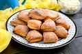 Tasty curd cheese cookies on a plate. Goose foot cookies. Homemade cakes for breakfast