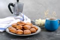 Tasty curd cheese cookies on a plate. Goose foot cookies. Homemade cakes and coffee for breakfast