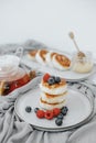 Tasty curd cheesecakes with berries on a plate