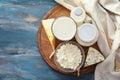 Tasty dairy products on wooden table