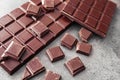 Tasty dark chocolate on grey background, closeup Royalty Free Stock Photo